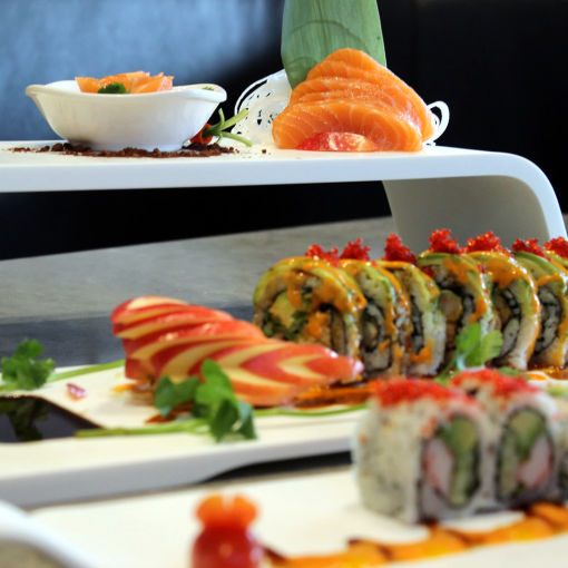Minimalist Sushi Dishes with decorative maki and sashimi on top